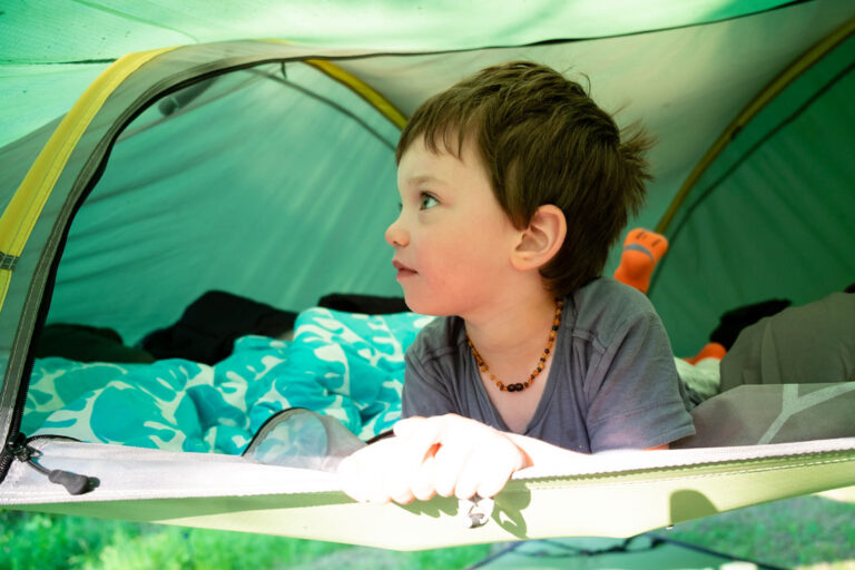 A child waking up on a Tentsile