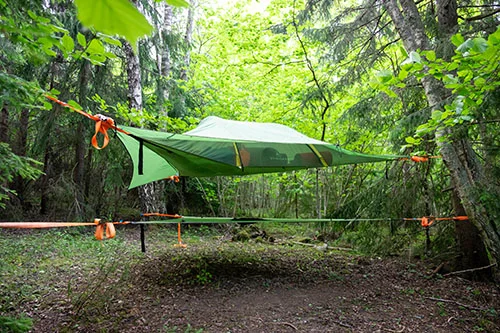 A green Tentsile installed on a super green area in Naawa Nature
